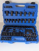 Open case showing organized Mastercraft black steel socket wrench set with ratchets, sockets, extensions, and bits.