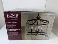 Box of Home Decorators Collection 4-Light Pendant Light showing brand, item image, and features.