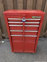 Front view of red Waterloo tool chest showing lock bar and padlock