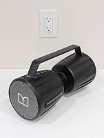 View of Monster Adventurer Force Bluetooth speaker showing front speaker grill with Monster logo and handle.