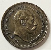 Close-up photo of the coin's obverse showing King Edward VII profile and inscriptions.