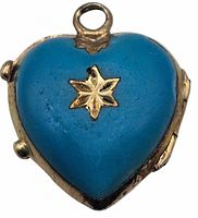 Front view of blue enamel heart-shaped pendant locket with gold star and black stone accents