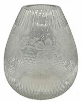 Front view of vintage clear glass vase showing ribbed texture and acid-etched floral design.