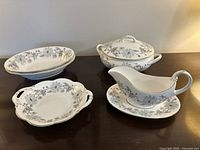 Photo of six Coalport Bone China pieces, listing the group of serving dishes including bowls, covered dish, gravy boat with plate, and small dish