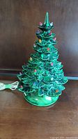 Full view of the vintage ceramic Christmas tree showing all branches and colored bulbs