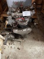 Front view of complete engine and gearbox on floor