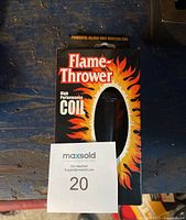 Front view of the Pertronix Flame-Thrower high performance coil packaging showing flame graphics, product name and model details.