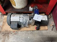 Front angled view of Lincoln Motors hydraulic pump showing motor and control components