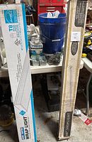 Boxed T8 LED Wrap Light fixture with labeling