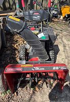 Front view showing 28" steel auger housing with Craftsman logo and EZ Steer decal