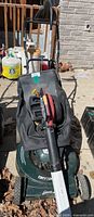 Craftsman 20" Special Edition gas lawn mower with attached black leaf catcher bag.