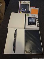 iPad Air tablet in box displayed with mobile device starter kit and ultra-thin protective case