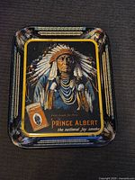 Full view of vintage Prince Albert advertising tray with Native American traditional motif and detailed border design.