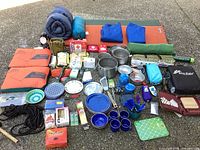 Overview of all camping gear arranged on ground