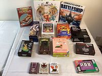 Photo of all games arranged on a table showing the variety of titles and box artwork.