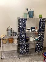 Both shelving units displayed with various gardening items on and around them.