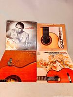 Four 12" vinyl LP albums featuring Laurindo Almeida with detailed album covers.
