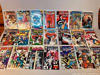 Full lot of five comics arranged on table