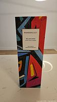 Front view of colorful box with Wanderlust Melbourne branding and scent details.
