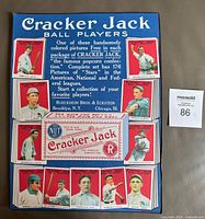 Front side of the reproduction paper sign with multiple colored baseball card images and promotional text.