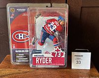 Front view of sealed Michael Ryder McFarlane figurine in original packaging showing player in Montreal Canadiens uniform and number 73.