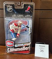 Full front view of sealed Mike Cammalleri McFarlane NHL figurine in packaging showing Canadiens logo backdrop and branding details.