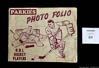 Front cover of the vintage 1952-53 Parkhurst Parkies photo folio album with printed illustration of NHL hockey players and title text.