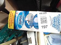 Box of Hurricane Spin Scrubber power brush showing product name, features, and images of the scrubber and brush heads.