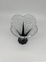 Top view of clear Caesar crystal flowerbud vase showing intricate cut geometric designs