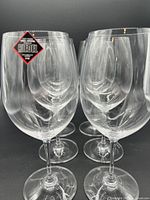 Six Riedel Bordeaux crystal wine glasses arranged in two rows showing their shape and size.