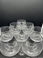 Top view of the set showing 8 clear balloon wine glasses arranged in a circular pattern.