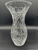 Full front view of the vase showing its shape and etched glass design