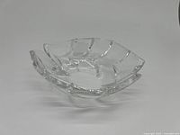 Clear Waterford Marquis Crystal Palm Double Lead Oval Bowl viewed at a slight angle showing the palm leaf cut design.