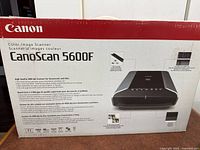 Canon CanoScan 5600F scanner box with front side showing model and features.