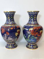 Front view of both vases side by side, showing overall shape, pattern and color.