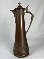 Full front view of pitcher on neutral background