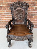 Full frontal view of chair against brick wall