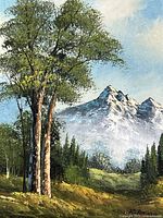 Close-up of the painting showing trees and mountain, highlighting brush detail and K. Amino signature.
