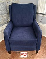 Front view of navy blue electric reclining armchair