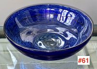 Bowl displayed at slight angle showing interior swirl pattern and depth