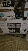 Box showing Cuisinart thermal coffee maker name and 10-cup brewing capacity