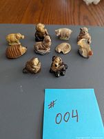 Top view of all 10 Wade animal figurines arranged on a surface