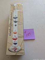 Photo of boxed Galileo thermometer showing exterior packaging.