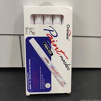 Packaged set of five white paint markers labeled Overseas PMA-520.