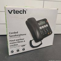 Front of product box showing VTech corded speakerphone telephone with caller ID and call waiting