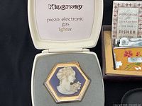 Kingsway piezo electronic gas lighter hexagonal with classical female relief in display case
