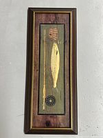 Front view of one framed Warren Kimble print featuring trout and fishing gear against rustic wooden background.
