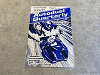 Front cover of Autoduel Quarterly magazine showing volumetric issue details and artwork of a futuristic armed vehicle in motion.