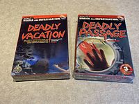 Photo of the two boxed murder mystery games titled Deadly Vacation and Deadly Passage, showing front box art and branding.