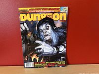 Full front cover of Dungeon Magazine Issue 118 featuring fantasy artwork and title.